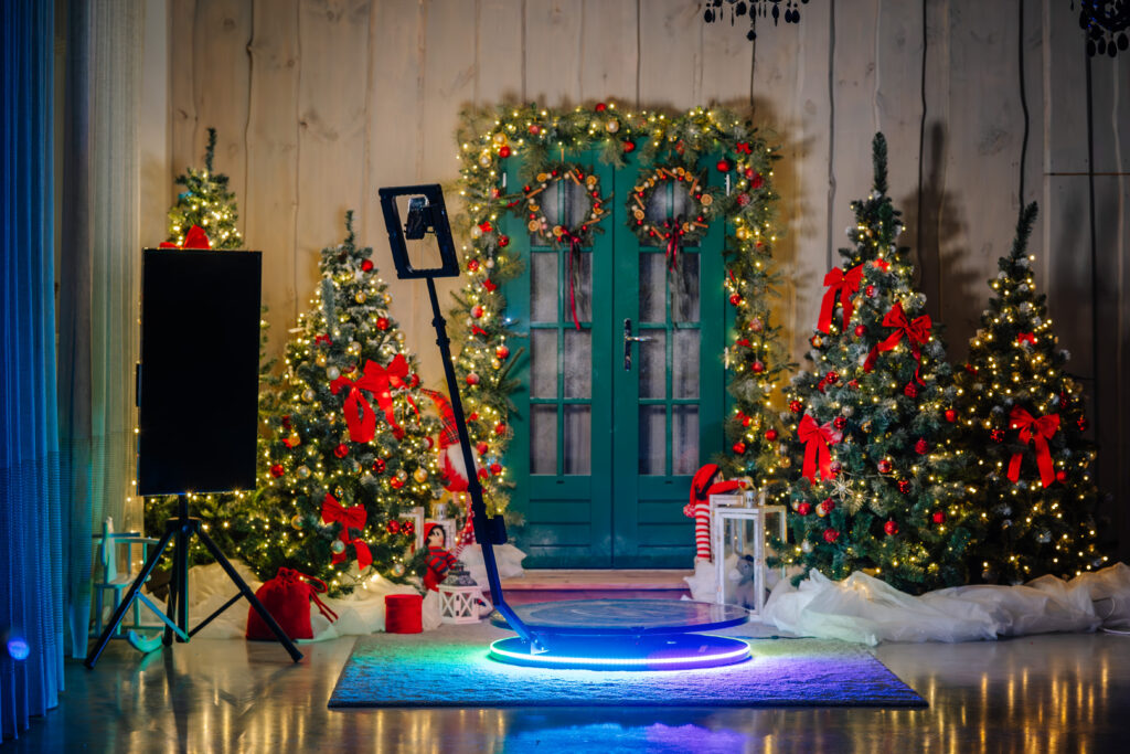 defocused view of a 360 photo booth used at an event, christmas party